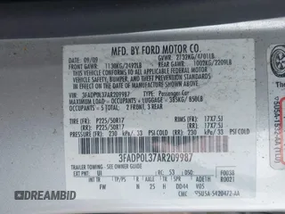 2010 Ford Fusion Hybrid with VIN 3FADP0L37AR209987, listed as a IAAI auction lot 42094849 with 124,912 mi miles. Bid and sale history available at carsss.com. Image 9.