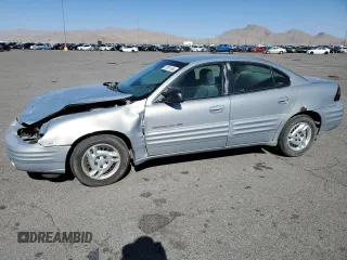 1999 Pontiac Grand Am SE2 with VIN 1G2NE52E5XM826878, listed as a Copart auction lot 77351164 with 241,463 mi miles and Salvage Title. Bid and sale history available at carsss.com. Image 1.