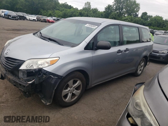 2015 Toyota Sienna L with VIN 5TDZK3DCXFS620092, listed as a Copart auction lot 61606095 with 130,624 mi miles and Salvage title. Bid and sale history available at DreamBid. Image 1.