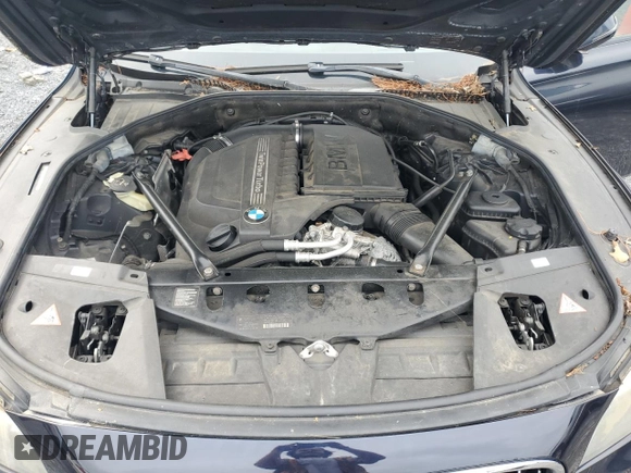 2014 BMW 7 Series 740Li xDrive with VIN WBAYF4C55ED281791, listed as a Copart auction lot 64210005 with 154,365 mi miles and Clean title. Bid and sale history available at DreamBid. Image 11.