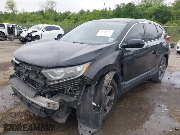 2017 Honda CR-V EX with VIN 7FARW1H59HE007171, listed as a IAAI auction lot 42033941 with 134,227 mi miles and . Bid and sale history available at DreamBid. Image 2.