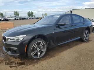 2019 BMW 7 Series 750i xDrive with VIN WBA7B0C53KG527537, listed as a Copart auction lot 64113345 with 36,820 mi miles and Salvage title. Bid and sale history available at DreamBid. Image 1.