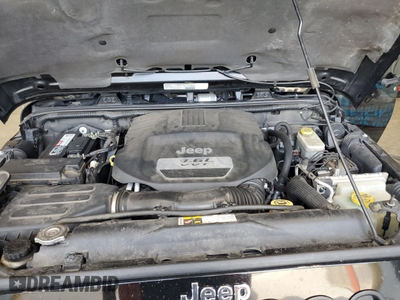 2013 Jeep Wrangler Unlimited Rubicon with VIN 1C4BJWFG0DL525304, listed as a Copart auction lot 59386085 with 130,043 mi miles and Clean title. Bid and sale history available at DreamBid. Image 12.