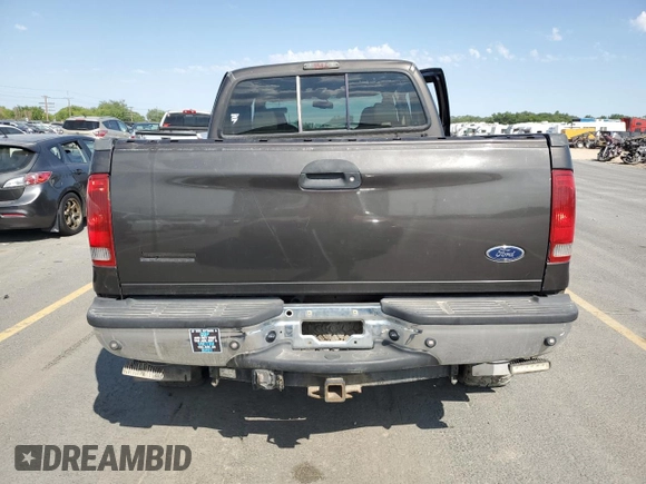 2007 Ford F-250 XL with VIN 1FTSW21P27EA22349, listed as a Copart auction lot 64703015 with 210,396 mi miles and Salvage title. Bid and sale history available at DreamBid. Image 6.