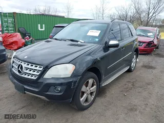 2009 Mercedes-Benz M-Class 3.5L with VIN 4JGBB86E09A470827, listed as a IAAI auction lot 42024915 with 212,537 mi miles. Bid and sale history available at carsss.com. Image 2.
