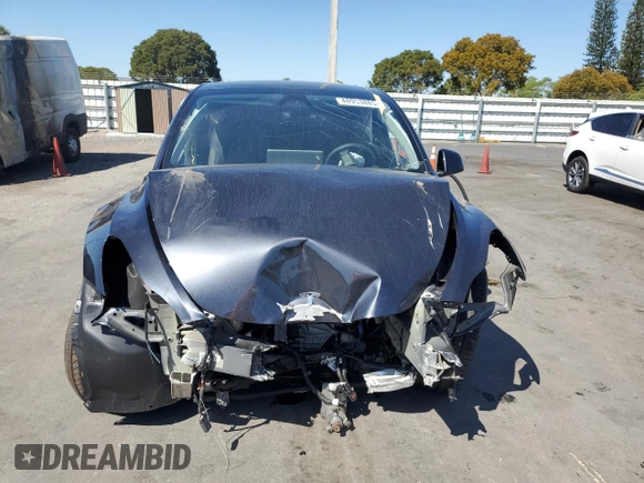 2024 Tesla Model Y Long Range с VIN 7SAYGDEE4RA243738, выставлен на аукционе Copart как лот 48953885 с пробегом Не указан миль и Списание • Salvage title. История ставок и продаж доступна на DreamBid. Изображение 5.