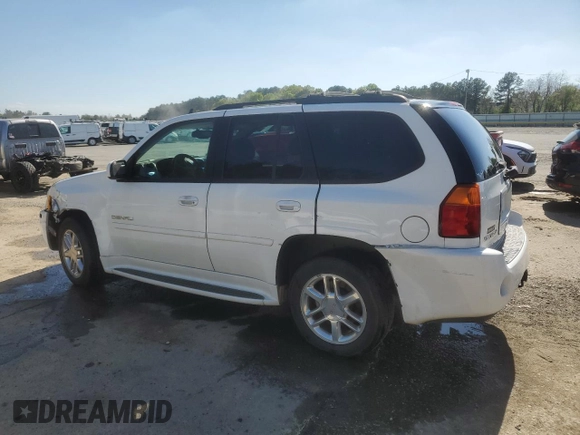 2007 GMC Envoy Denali with VIN 1GKES63M172227637, listed as a Copart auction lot 49858135 with 198,736 mi miles and Salvage Title. Bid and sale history available at carsss.com. Image 2.