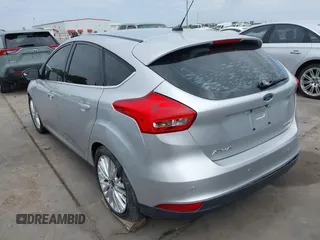 2015 Ford Focus Titanium with VIN 1FADP3N23FL356822, listed as a IAAI auction lot 41981053 with 115,584 mi miles and . Bid and sale history available at DreamBid. Image 3.