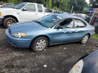 2005 Ford Taurus SE with VIN 1FAFP53U65A106851, listed as a Copart auction lot 64367405 with Not provided miles and Salvage title. Bid and sale history available at DreamBid. Image 1.