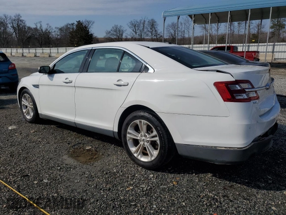 2016 Ford Taurus SEL with VIN 1FAHP2E96GG128073, listed as a Copart auction lot 44019985 with 104,090 mi miles and Salvage Title. Bid and sale history available at DreamBid. Image 2.