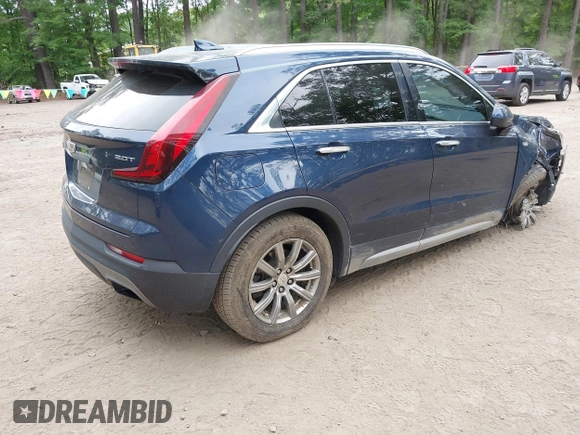 2019 Cadillac XT4 FWD Premium Luxury with VIN 1GYFZCR46KF163883, listed as a IAAI auction lot 42403733 with 80,275 mi miles and . Bid and sale history available at DreamBid. Image 4.