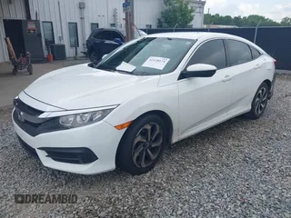 2017 Honda Civic LX with VIN 19XFC2F58HE010262, listed as a IAAI auction lot 42118124 with 125,535 mi miles and . Bid and sale history available at DreamBid. Image 17.