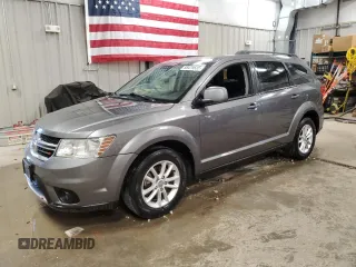 2013 Dodge Journey SXT with VIN 3C4PDDBG4DT587168, listed as a Copart auction lot 58479535 with 82,503 mi miles and Clean title. Bid and sale history available at DreamBid. Image 1.