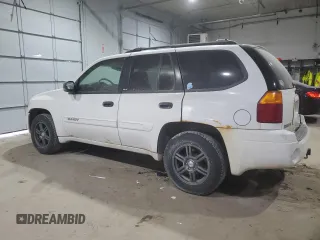2003 GMC Envoy SLE z VIN 1GKDT13S632156357, wystawiony jako Copart lot #41398035 z przebiegiem 160 338 mil mil oraz Szkoda całkowita • Salvage title. Historia ofert i sprzedaży dostępna na DreamBid. Obrazek 2.