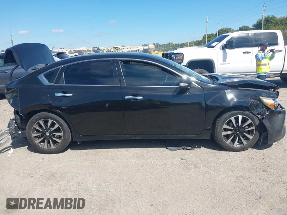 2018 Nissan Altima S with VIN 1N4AL3AP8JC109000, listed as a IAAI auction lot 41669061 with 238,560 mi miles and . Bid and sale history available at DreamBid. Image 13.