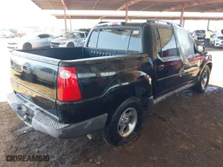 2005 Ford Explorer Sport Trac XLS with VIN 1FMZU67K65UA48667, listed as a IAAI auction lot 41637238 with 213,925 mi miles. Bid and sale history available at carsss.com. Image 4.