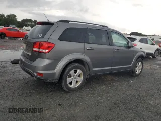 2012 Dodge Journey SXT с VIN 3C4PDCBG3CT264948, выставлен на аукционе Copart как лот 59471525 с пробегом 88 092 миль миль и Списание • Salvage title. История ставок и продаж доступна на DreamBid. Изображение 3.