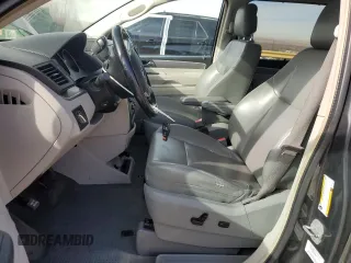 2011 Volkswagen Routan SE with VIN 2V4RW3DGXBR642528, listed as a Copart auction lot 45082055 with 167,067 mi miles and Salvage title. Bid and sale history available at DreamBid. Image 7.