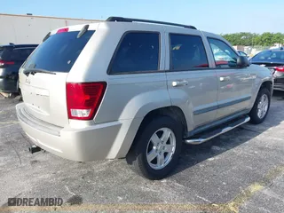 2007 Jeep Grand Cherokee Laredo with VIN 1J8GS48K77C545071, listed as a IAAI auction lot 41999998 with 144,966 mi miles. Bid and sale history available at carsss.com. Image 4.