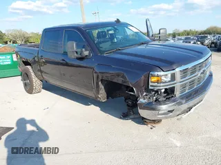 2015 Chevrolet Silverado 1500 LT with VIN 3GCUKREC0FG504717, listed as a IAAI auction lot 41668156 with 79,641 mi miles and . Bid and sale history available at DreamBid. Image 1.