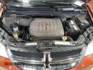 2012 Dodge Grand Caravan SE with VIN 2C4RDGBG5CR302148, listed as a Copart auction lot 54129475 with 191,187 mi miles and Clean Title. Bid and sale history available at DreamBid. Image 12.