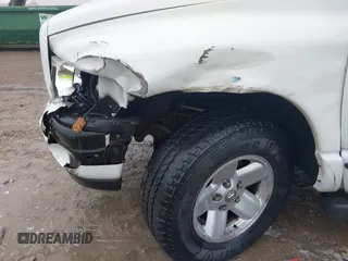 2003 Dodge 1500 SLT z VIN 1D7HU18N93J621948, wystawiony jako IAAI lot #41448520 z przebiegiem 200 091 mil mil oraz . Historia ofert i sprzedaży dostępna na DreamBid. Obrazek 6.