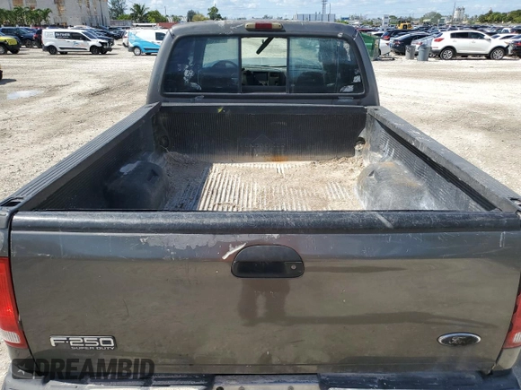 2002 Ford F-250 XL with VIN 1FTNW20F12EB93947, listed as a Copart auction lot 77836054 with 322,030 mi miles and Salvage Title. Bid and sale history available at DreamBid. Image 6.