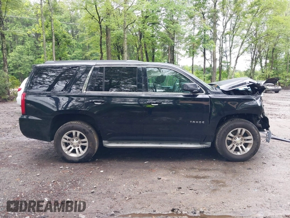 2015 Chevrolet Tahoe LT with VIN 1GNSCBKC9FR600997, listed as a IAAI auction lot 42383789 with 161,151 mi miles and . Bid and sale history available at DreamBid. Image 14.
