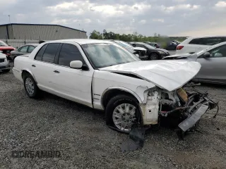 2003 Mercury Grand Marquis GS Convenience z VIN 2MEFM74WX3X633910, wystawiony jako Copart lot #52999865 z przebiegiem 207 970 mil mil oraz Szkoda całkowita • Salvage title. Historia ofert i sprzedaży dostępna na DreamBid. Obrazek 4.