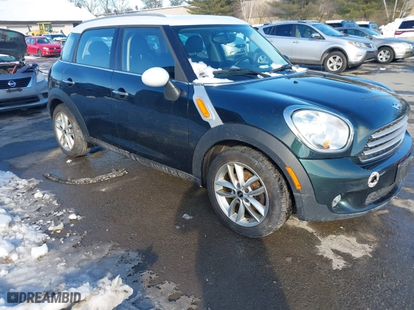 2013 MINI Cooper Countryman with VIN WMWZB3C57DWR35705, listed as a IAAI auction lot 41620080 with 197,884 mi miles. Bid and sale history available at carsss.com. Image 1.
