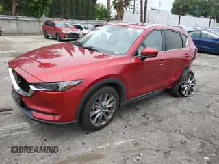 2020 Mazda CX-5 Grand Touring with VIN JM3KFADM1L1837775, listed as a Copart auction lot 55314595 with 82,359 mi miles and Clean Title. Bid and sale history available at DreamBid. Image 1.