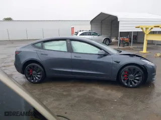 2022 Tesla Model 3 Performance with VIN 5YJ3E1EC2NF336135, listed as a IAAI auction lot 41853826 with 1 mi miles. Bid and sale history available at carsss.com. Image 13.