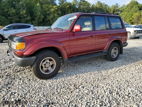 1997 Toyota Land Cruiser with VIN JT3HJ85J8V0182381, listed as a Copart auction lot 71717124 with 238,051 mi miles and Salvage Title. Bid and sale history available at carsss.com. Image 1.