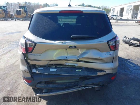 2017 Ford Escape SE with VIN 1FMCU9GD1HUC70823, listed as a IAAI auction lot 41898457 with 86,042 mi miles and . Bid and sale history available at DreamBid. Image 6.