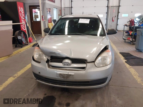 2008 Hyundai Accent GS with VIN KMHCM36C78U066341, listed as a IAAI auction lot 41377961 with 354,357 mi miles. Bid and sale history available at carsss.com. Image 12.