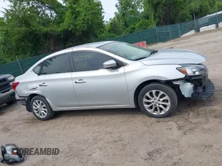 2019 Nissan Sentra S with VIN 3N1AB7AP9KY311361, listed as a IAAI auction lot 42258460 with 65,545 mi miles and . Bid and sale history available at DreamBid. Image 14.