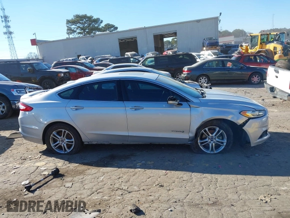 2016 Ford Fusion Titanium Hybrid with VIN 3FA6P0RU7GR364573, listed as a IAAI auction lot 41298298 with 189,900 mi miles. Bid and sale history available at carsss.com. Image 13.