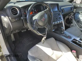 2009 Nissan GT-R Premium z VIN JN1AR54F89M250164, wystawiony jako Copart lot #71599114 z przebiegiem 61 041 mil mil oraz Szkoda całkowita • Salvage title. Historia ofert i sprzedaży dostępna na DreamBid. Obrazek 8.