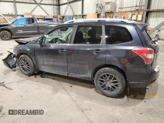 2014 Subaru Forester with VIN JF2SJHLC8EH492751, listed as a Copart auction lot 85634954 with 176,328 mi miles and Salvage title. Bid and sale history available at DreamBid. Image 2.