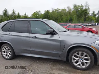 2014 BMW X5 xDrive50i with VIN 5UXKR6C54E0C02423, listed as a IAAI auction lot 42278044 with 122,370 mi miles and . Bid and sale history available at DreamBid. Image 13.