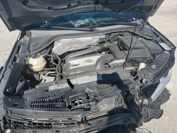 2012 Volkswagen Tiguan S z VIN WVGBV7AX3CW088330, wystawiony jako Copart lot #76722704 z przebiegiem 107 018 mil mil oraz Nie do naprawy • Non repairable. Historia ofert i sprzedaży dostępna na DreamBid. Obrazek 12.