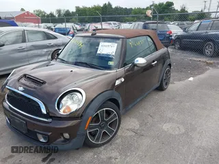 2011 MINI Convertible S with VIN WMWZP3C50BTX84044, listed as a IAAI auction lot 42669717 with Not provided miles and . Bid and sale history available at DreamBid. Image 2.