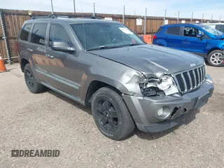 2007 Jeep Grand Cherokee Laredo z VIN 1J8HR48P07C697334, wystawiony jako IAAI lot #42327347 z przebiegiem 179 087 mil mil oraz . Historia ofert i sprzedaży dostępna na DreamBid. Obrazek 1.