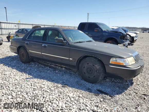 2003 Mercury Grand Marquis GS Convenience with VIN 2MEFM74W03X638534, listed as a Copart auction lot 49371535 with 335,360 mi miles and Salvage Title. Bid and sale history available at DreamBid. Image 4.
