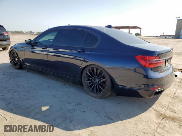 2016 BMW 7 Series 740i с VIN WBA7E2C55GG504304, выставлен на аукционе Copart как лот 59251345 с пробегом 115 942 миль миль и Чистый • Clean title. История ставок и продаж доступна на DreamBid. Изображение 2.