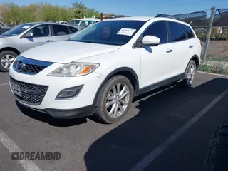 2012 Mazda CX-9 Grand Touring z VIN JM3TB3DA5C0349176, wystawiony jako IAAI lot #41960691 z przebiegiem 207 445 mil mil oraz . Historia ofert i sprzedaży dostępna na DreamBid. Obrazek 2.