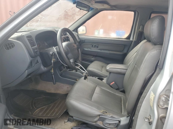 2001 Nissan Frontier SE z VIN 1N6ED27T51C307408, wystawiony jako Copart lot #57169705 z przebiegiem 323 598 mil mil oraz Czysty tytuł • Clean title. Historia ofert i sprzedaży dostępna na DreamBid. Obrazek 7.