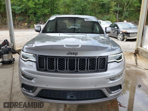 2018 Jeep Grand Cherokee High Altitude with VIN 1C4RJFCT8JC344110, listed as a Copart auction lot 60257065 with 94,917 mi miles and Salvage title. Bid and sale history available at DreamBid. Image 5.