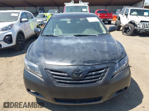 2007 Toyota Camry LE with VIN 4T1BK46K27U030912, listed as a IAAI auction lot 42106302 with 198,655 mi miles and . Bid and sale history available at DreamBid. Image 6.