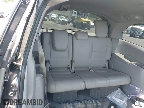 2014 Honda Odyssey EX-L z VIN 5FNRL5H61EB041962, wystawiony jako IAAI lot #42282873 z przebiegiem 134 884 mil mil oraz . Historia ofert i sprzedaży dostępna na DreamBid. Obrazek 8.